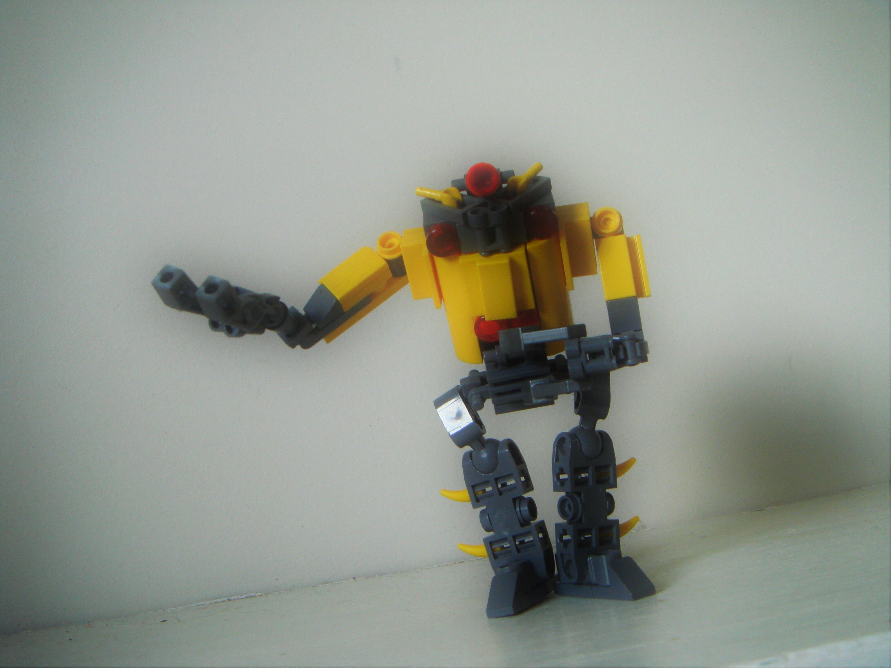 lego robot yellow