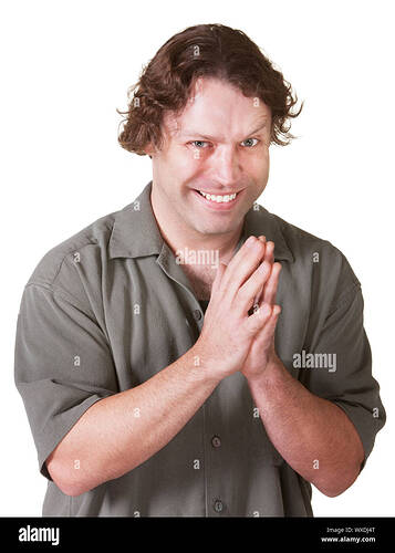 man-over-white-background-with-hands-together-and-evil-grin-WXDJ4T