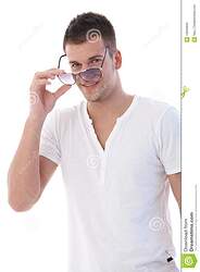 young-man-putting-sunglasses-smiling-19506655